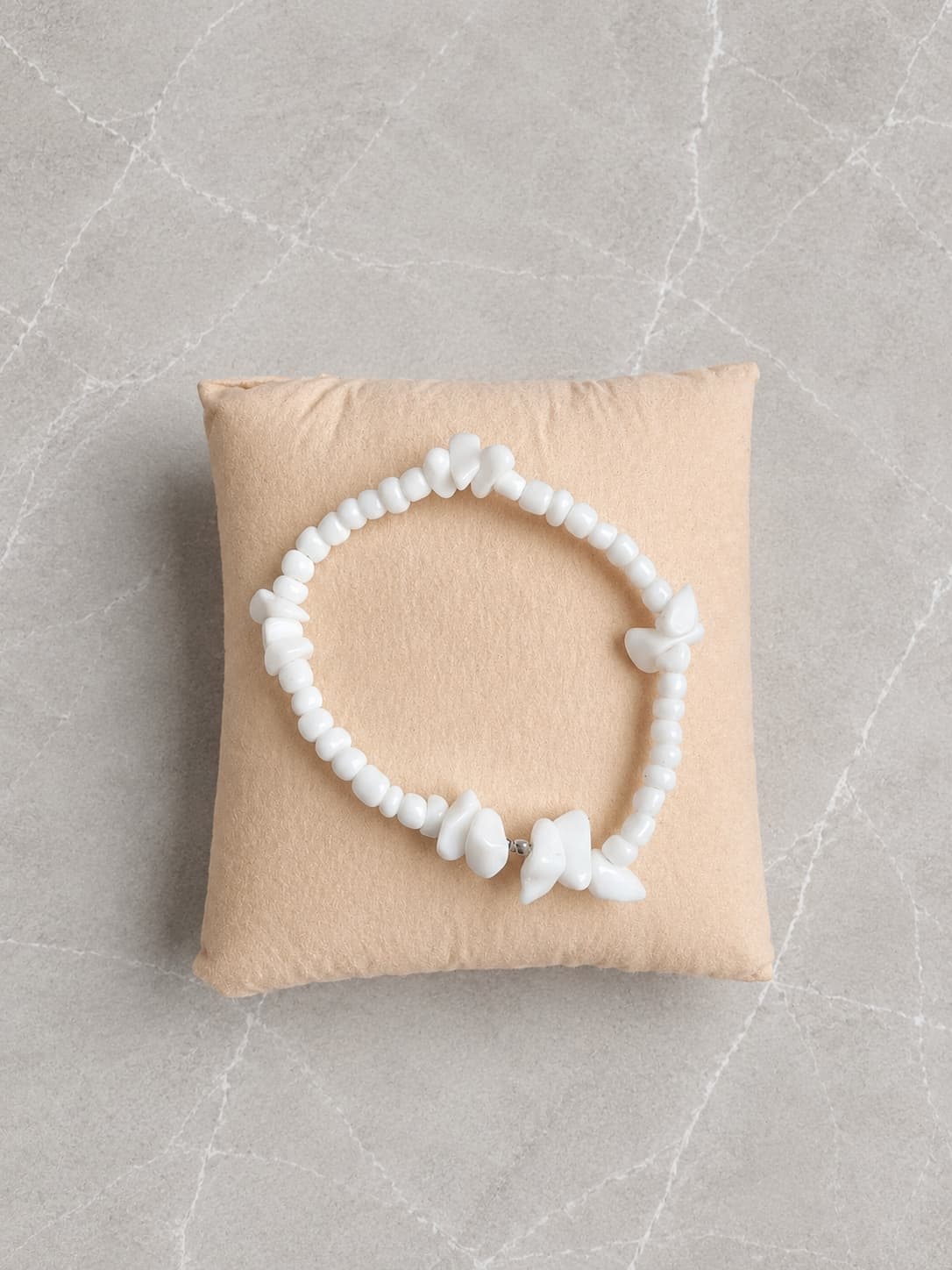 oréva Signature bracelet on skin, golden hour