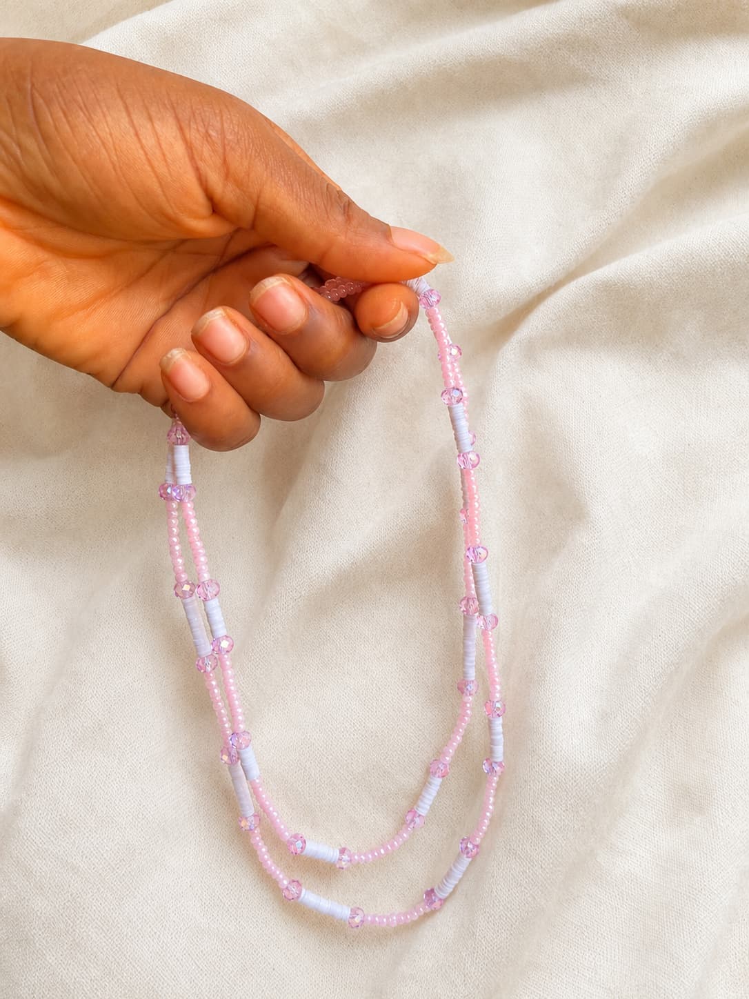 oréva Seed Bead waist strand in warm light